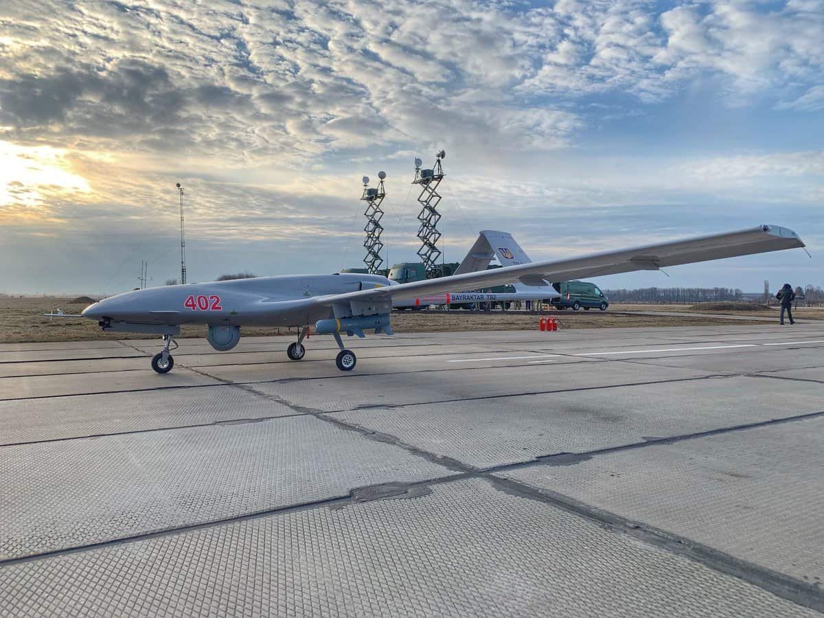 Bayraktar TB2 uncrewed aircraft of the Ukrainian Air Force on the ground with control stations behind it
