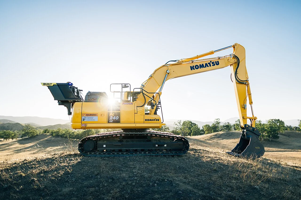 Komatsu excavator equipped with the Built Robotics Exosystem working autonomously on a graded construction site