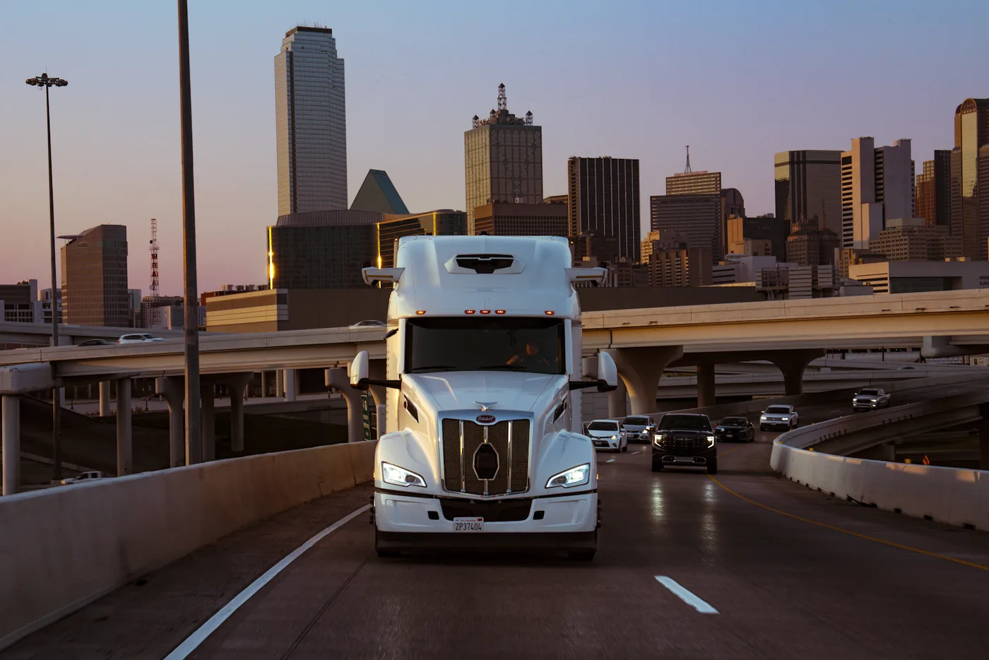 Waabi Driver-equipped autonomous freight truck on a road