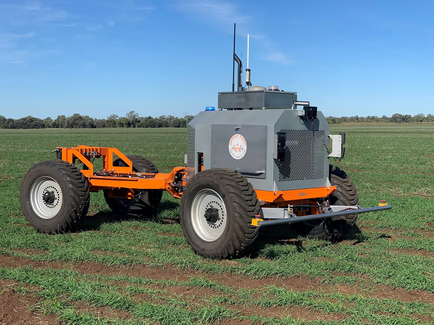 Official SwarmFarm media-gallery image of a SwarmBot in a field.