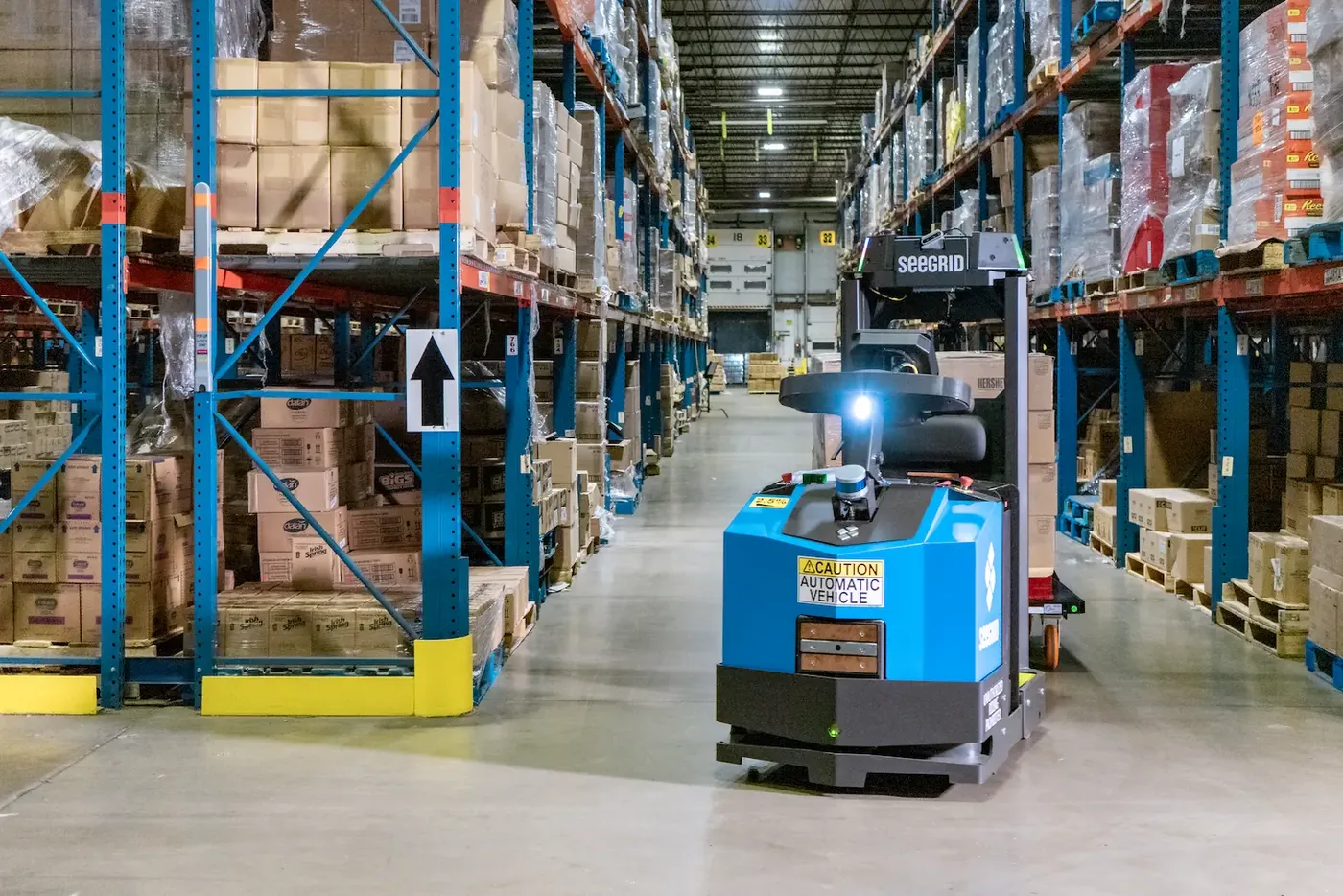 Seegrid Tow Tractor S7 autonomous tow vehicle in a facility