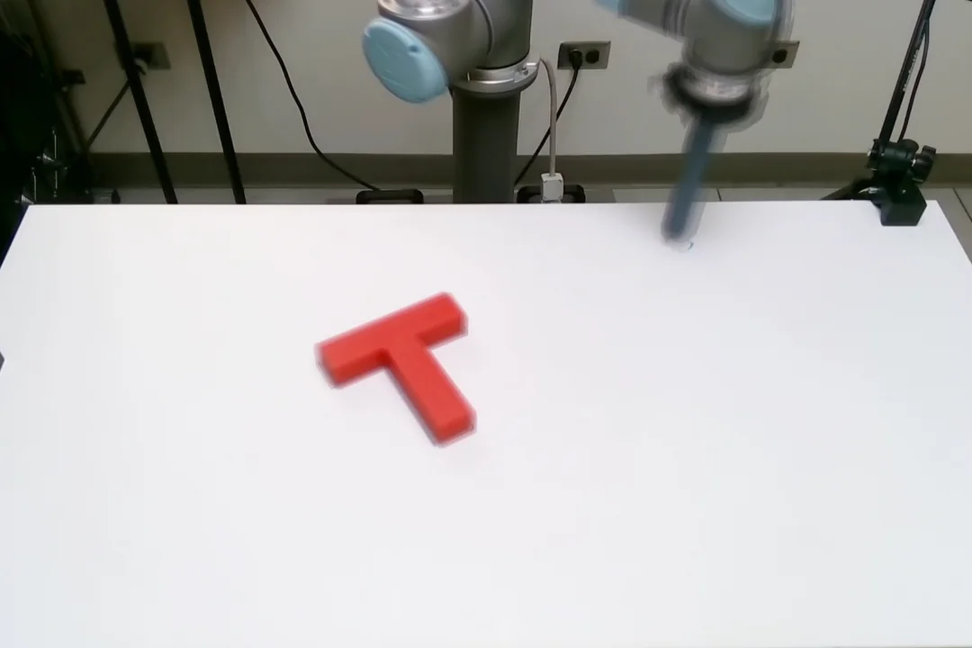 Motion-trail visualization of a robot arm executing Diffusion Policy on the Push-T benchmark with a red T-shaped block.