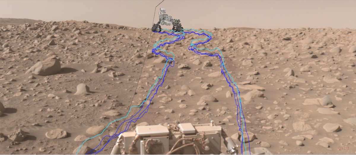 Perseverance rover view across a Martian boulder field annotated with blue AutoNav wheel paths